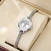 Women's high appearance level vivid exquisite Arabic numerals dial small dial steel band quartz watch. 3