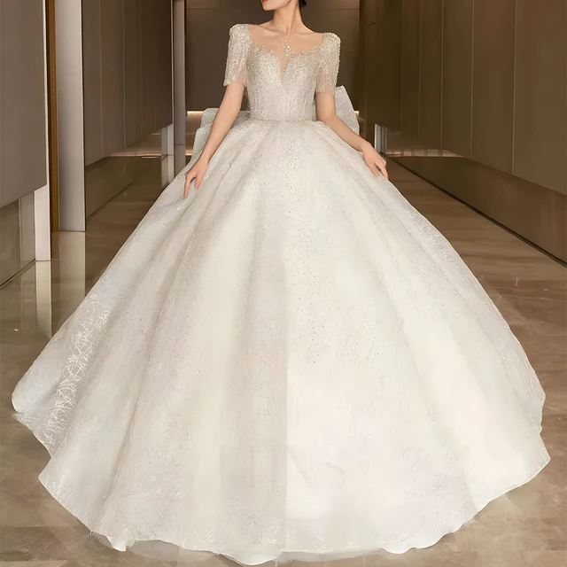 Jancember Exquisite Elegant Wedding Dresses O-Neck Illusion Short Sleeves Ball Gown Bow Backless Sequined Vestido Noiva LSHT007 10