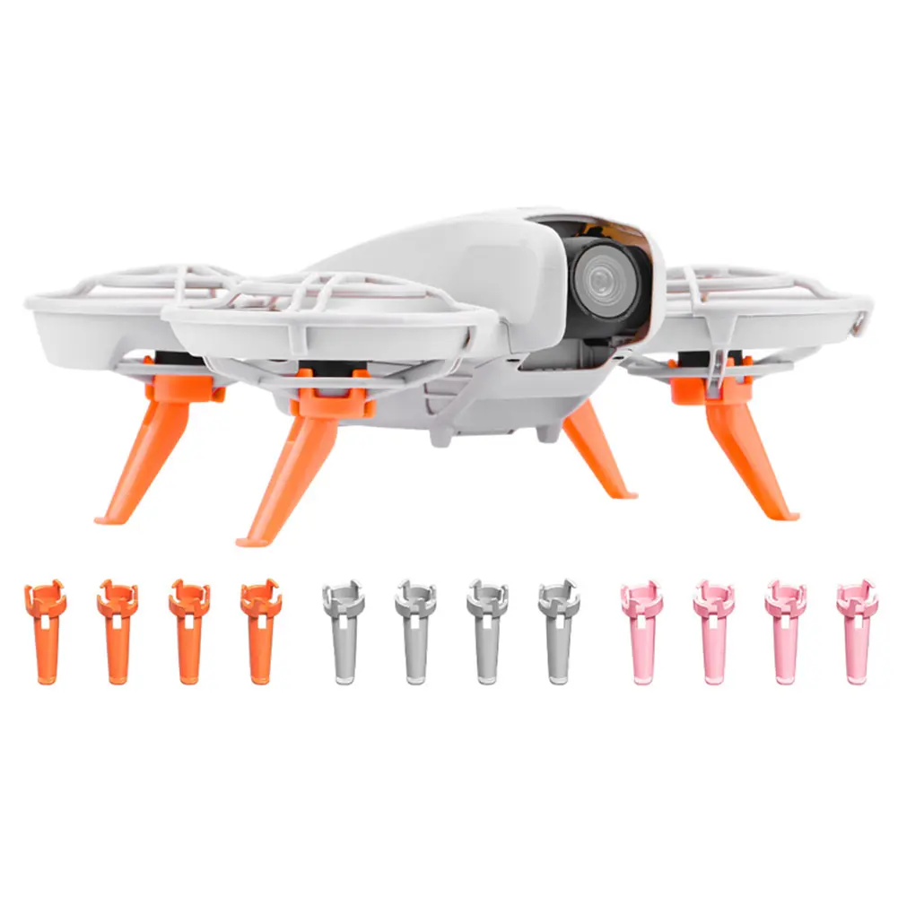 Train d'atterrissage surélevé orange pour DJI Neo, fixé sous le drone avec vis apparentes.