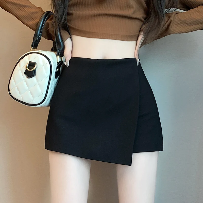 Black skirt, women's high waisted and slim A-line skirt, short skirt, 2023 new winter design, buttocks wrapped pants skirt