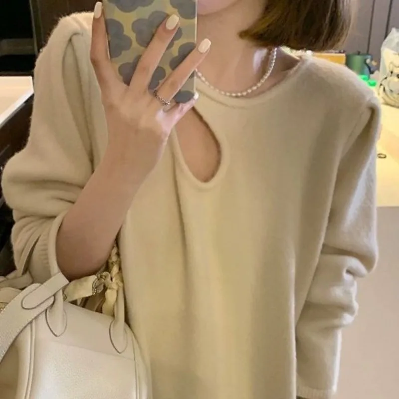 

2023 New Women's Autumn and Winter Crowd Design Feeling Slim and Sleeved Bubble Sleeves Mid length Sweater Dress