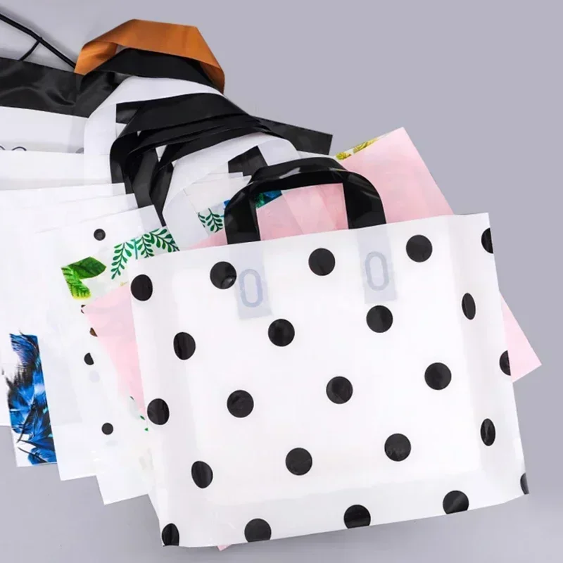 50pcs Plastic Tote Bags Clothing Shoes Shopping Bag Portable Gift Packaging Jewelry Candy Christmas and New Year Party Supplies 3