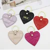 Wholesale free custom initial keychain metal ring embossed croco pattern genuine leather heart car leather keychains 3
