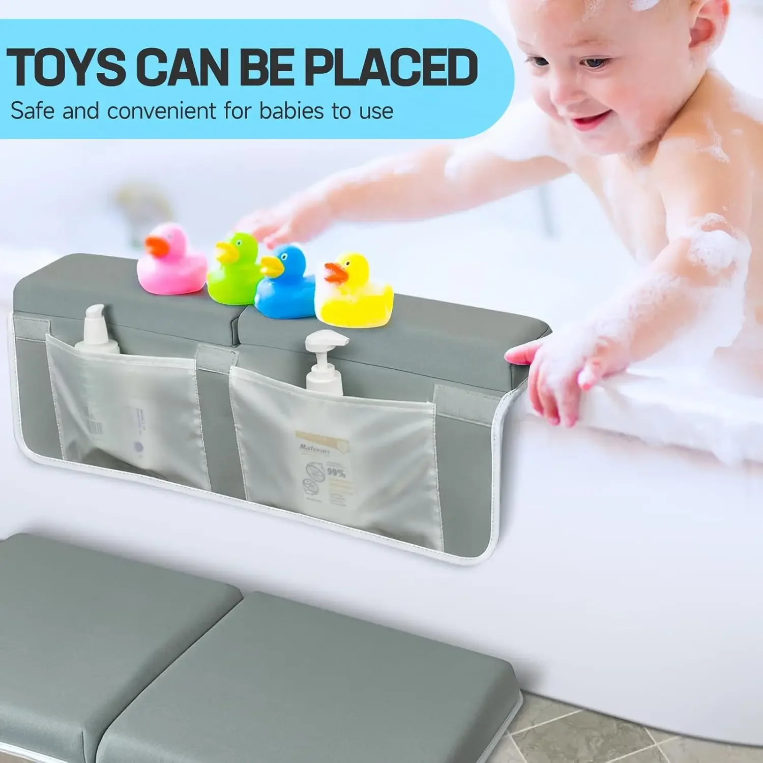 White padded bath kneeler with elbow rest pad and attached storage bag on tiled floor.