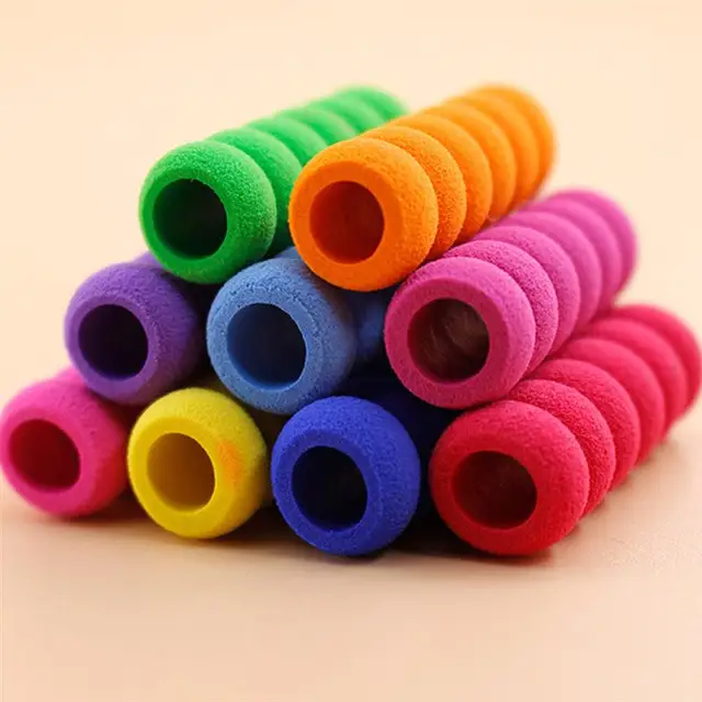 Foam grip training aids for comfortable and correct writing