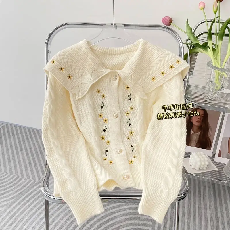 

Embroidered flowers short knit sweater large lapel ruffled pearl buttons cardigan sweater female fall and winter new Frenchstyle