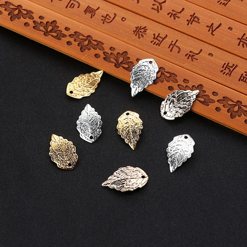 

2022New 1000Pcs Mini Aloy Iron Leaves Button for DIY Jewelry Eearring and Nnecklace Pendants or Hair Accessories ZG10-ZG11