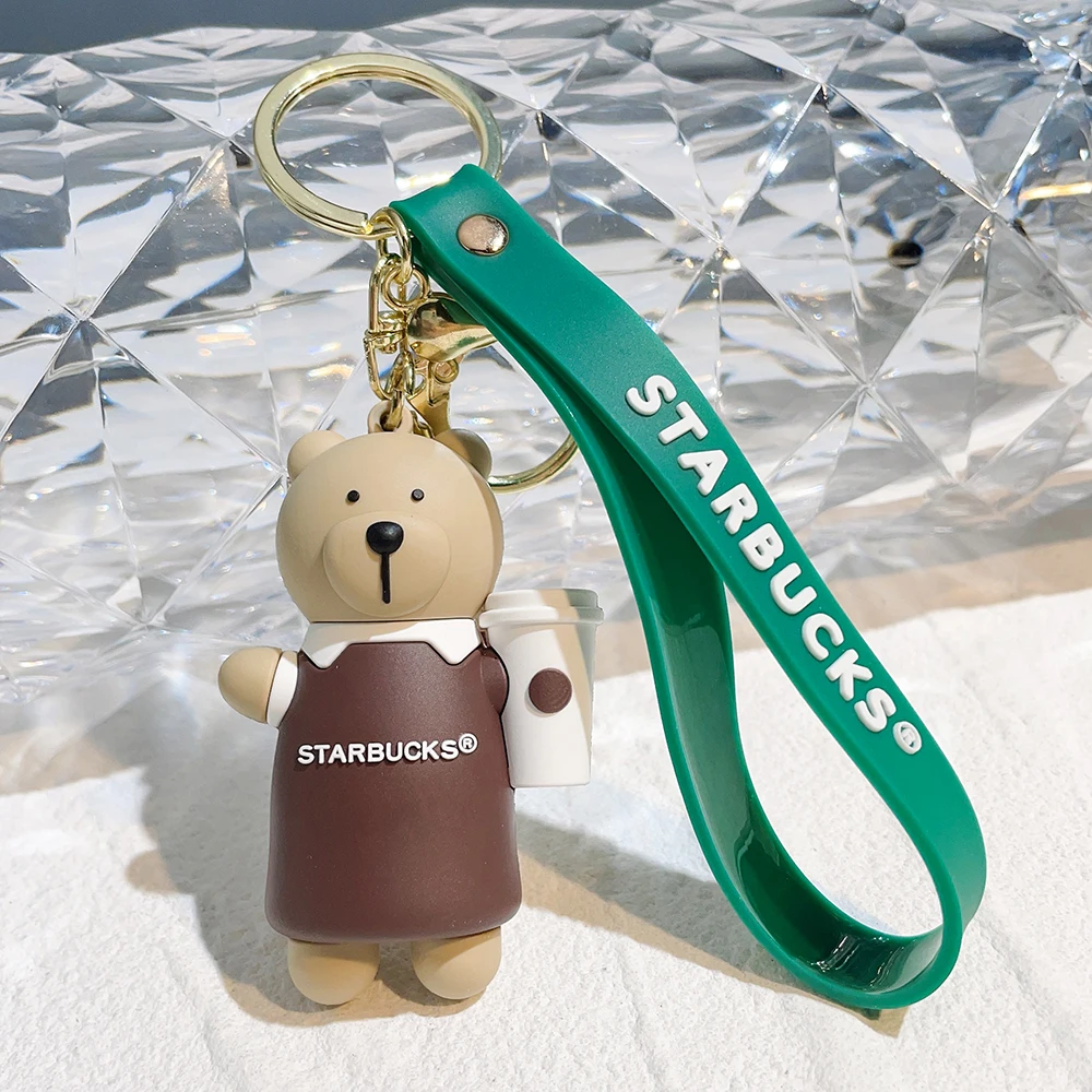 https://ae01.alicdn.com/kf/S6ddbbedd638b42239e4e739ebe9bc087O/Starbucks-Bear-3D-Cartoon-Silicone-Keychain-Cute-Doll-Gift-Pendant-Car-Keyring-Mobile-Phone-Bag-Key.jpg