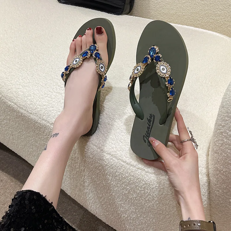 https://ae01.alicdn.com/kf/S6ddbf2da5d2c44eda96588007ce0a832Z/2023-Fashion-Women-s-Shoes-Summer-New-Design-Flip-flops-Female-Blue-Eyes-Crystal-Series-Fashion.jpg