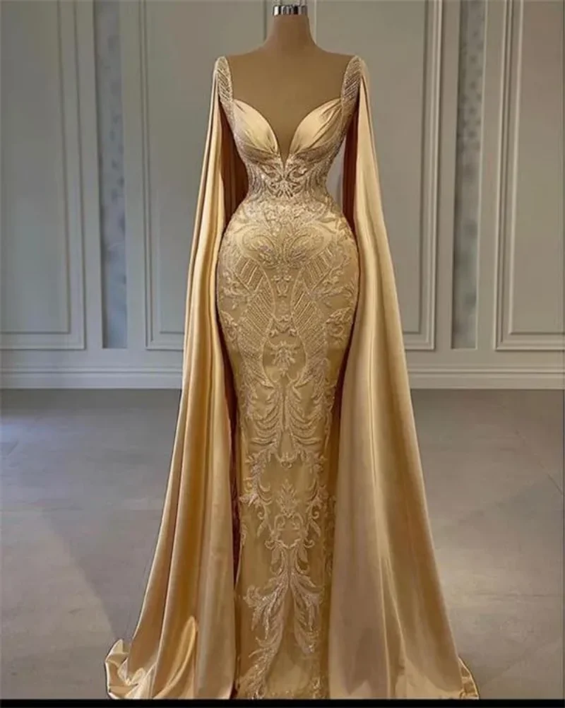 

2024 Sexy Prom Dresses Gold Long Cape Sleeves Lace Appliques Cutaway Sides Mermaid Satin Evening Gowns Party Dress Open Back