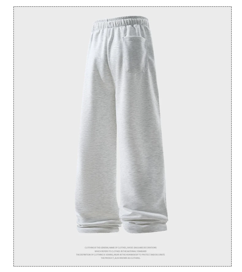 Man wearing loose wide-leg sweatpants with drawstring waist in a casual autumn streetwear setting white 03