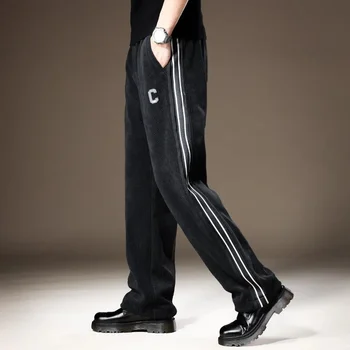 Pantaloni sportivi morbidi da uomo con struttura in autunno inverno Pantaloni casual sportivi a righe belli cadenti a gamba larga 1
