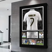 ⁦لوحة جدارية خشبية بتصميم كولاج لقميص "كريستيانو رونالدو" |  Cristiano Ronaldo Shirt Collage Wooden Wall Art⁩ - الصورة ⁦2⁩
