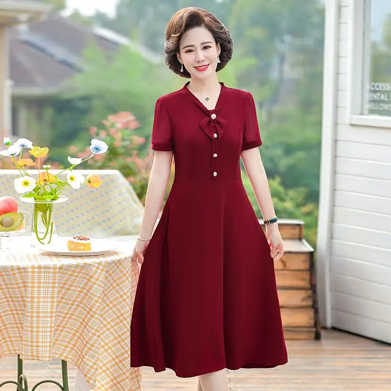 

Elegant V-Neck Solid Color Button Bow Prom Dresses Women's Clothing 2024 Summer New Loose Short Sleeve Office Lady Party Dress
