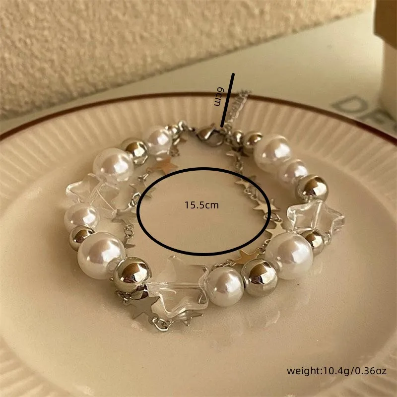 Pearl bracelet with zinc alloy chain detail