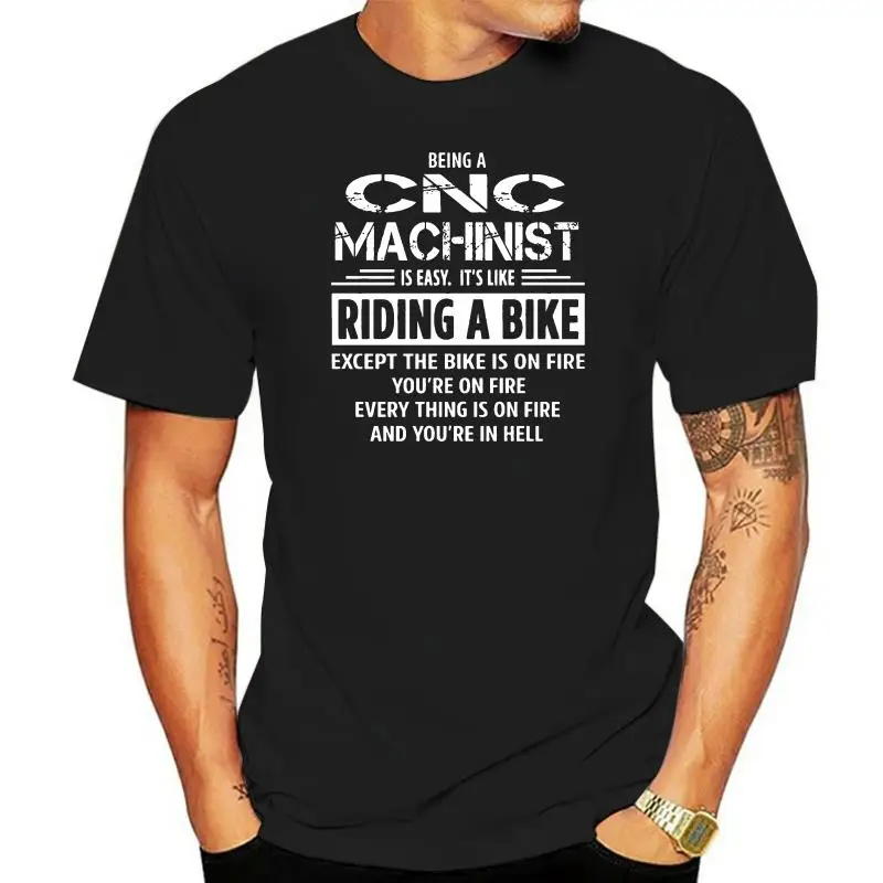 

Men T Shirt Being A Cnc Machinist - Riding A Bike Women T-Shirt