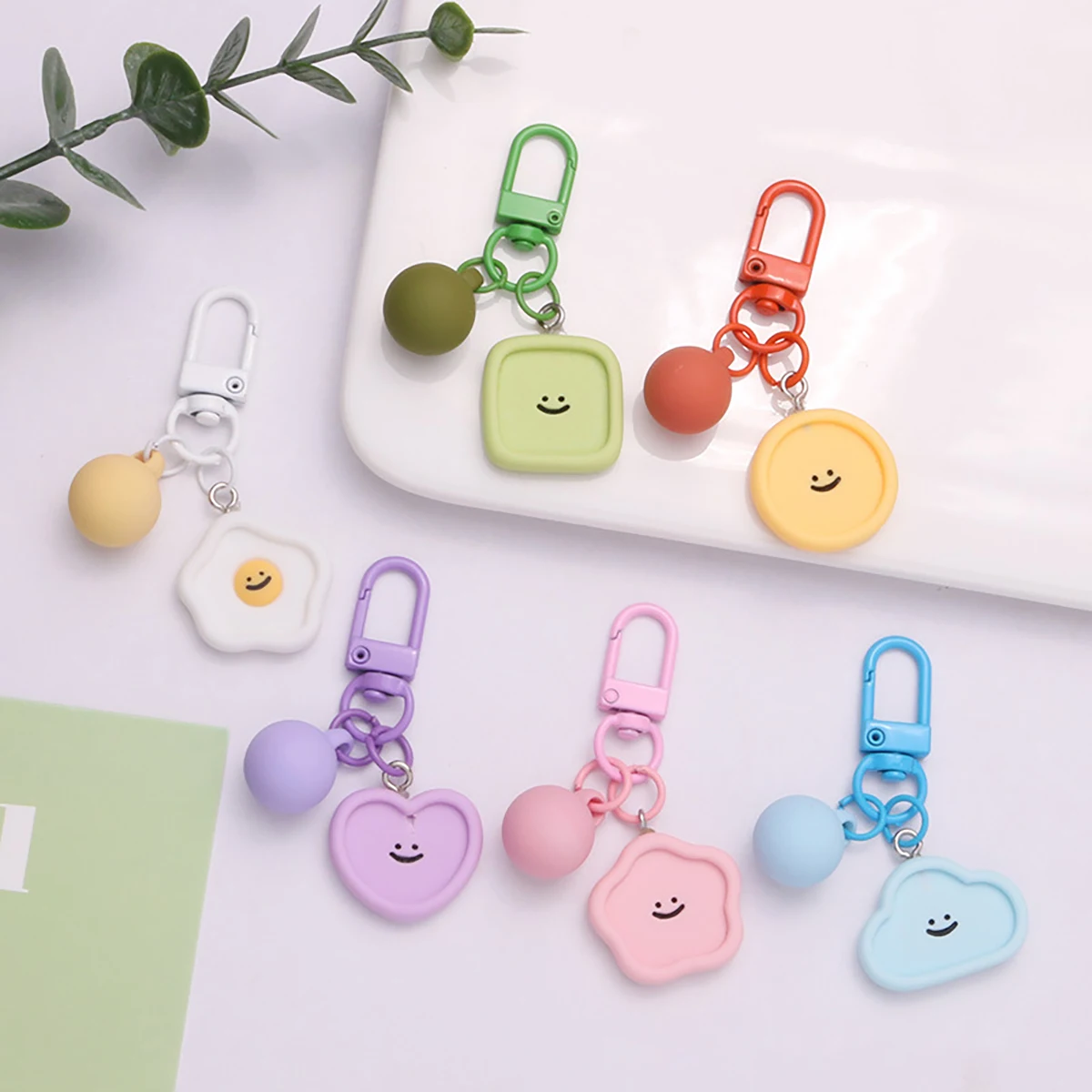 لطيف الوجه المبتسم الراتنج المفاتيح القلب زهرة سحا...