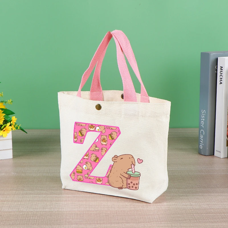 Capibara 여성을위한 귀여운 토트 백 애니메이션 Capybara 편지 A-Z 핸드백 소녀 쇼핑 여행 정리 캔버스 파우치 선물 뜨거운 판매