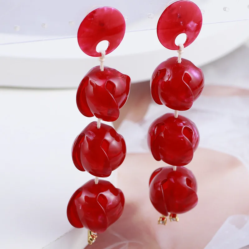 

European and American lightweight resin bud style long exaggerated earrings