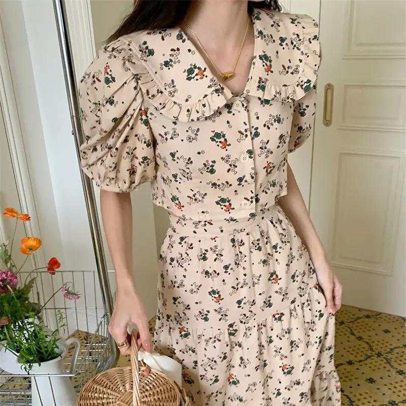 Korean girl summer new cute and gentle bubble sleeve short floral shirt high waisted A-line skirt two-piece set for women