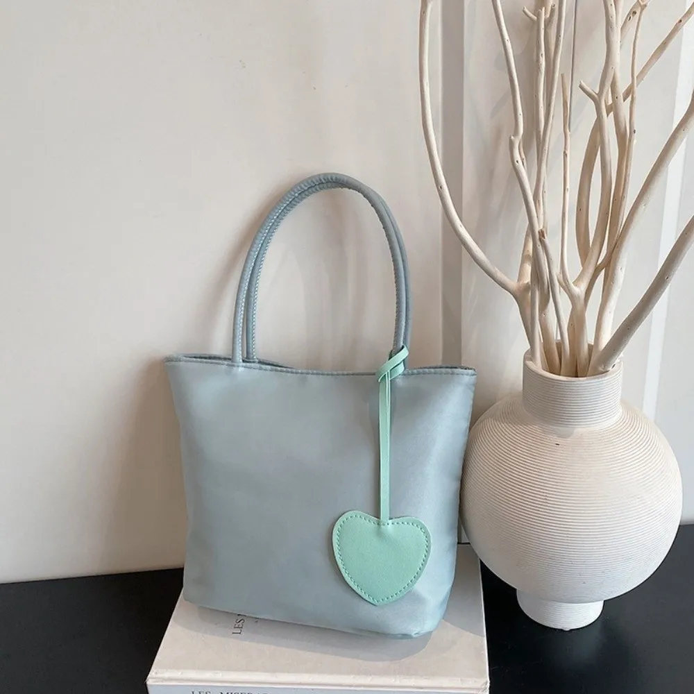 Neue Macaron-Farbene Mini-Tragetasche Leichte Mini-Schultertasche Vielseitiges Design Nylon-Handtasche für Damen – Detail 2