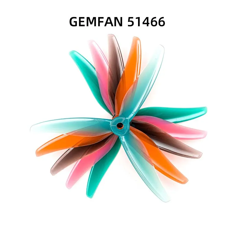 Hélice GEMFAN 51466 MCK V2 5 pouces 3 pales vue de dessus, pale noire mate et centre orange
