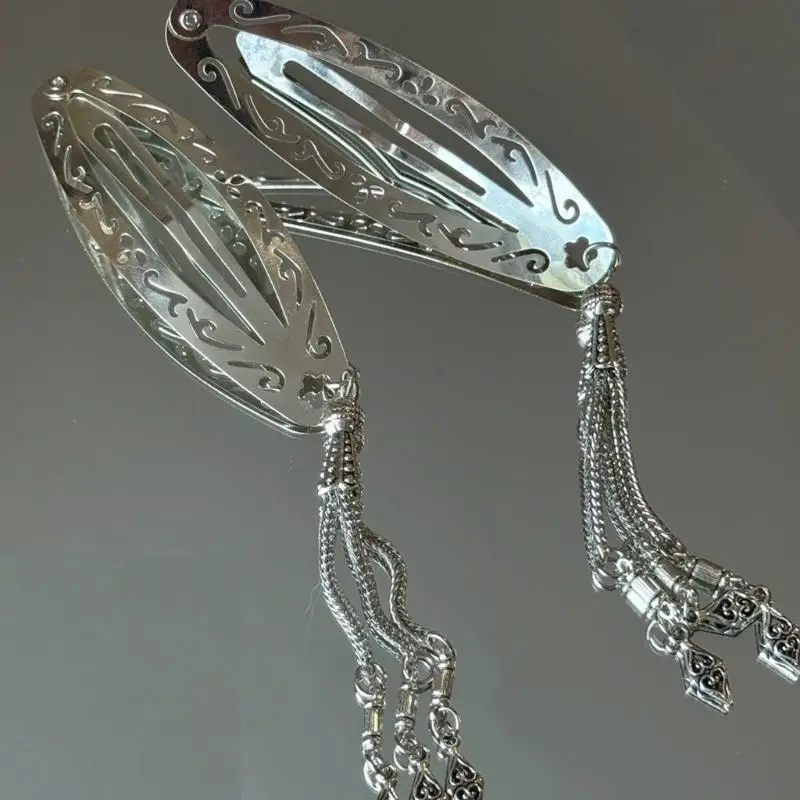 A52E Elegante ovale filigrane Haarspange mit baumelnden Quasten Vintage chinesisch inspirierte Designs Haarschmuck aus Legierung – Detail 1