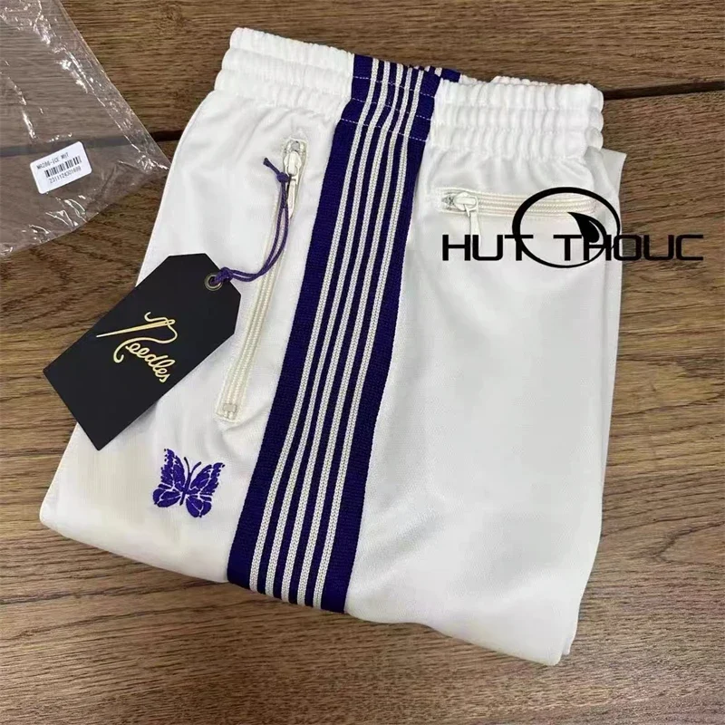 

23SS New Style White Needles Sweatpants Men Women Embroidered Butterfly Fashion AWGE Drawstring Track Pants