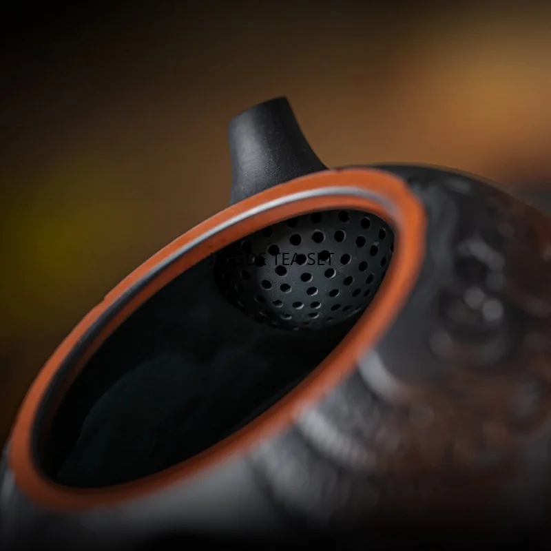 Purple pottery zodiac dragon carving handmade antique relief teapot household teapot Kung Fu tea set teapot