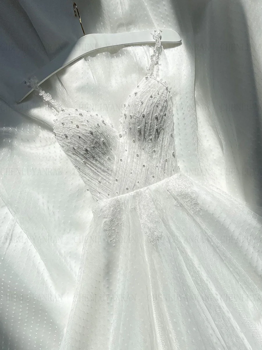 

Boho Elegant Wedding Dresses V-Neck Spaghetti Straps Sexy Bride Gowns Applique Pearls Long Dress For Women 2023 Robe De Mariée