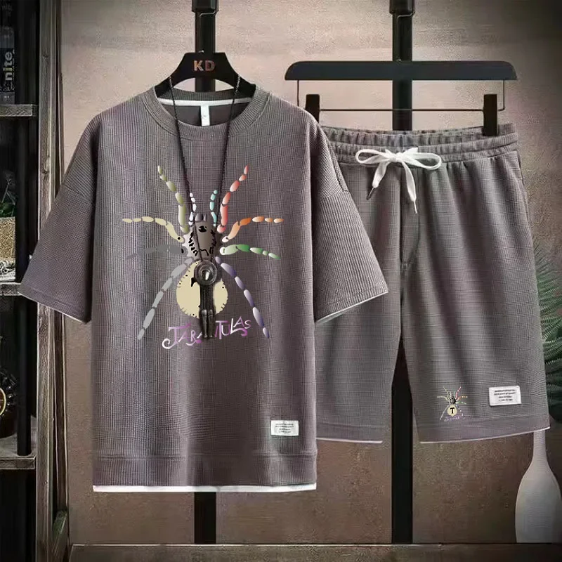 Conjunto deportivo informal de marca de moda de verano para hombre con pantalones cortos holgados de manga corta y cuello redondo, conjunto de dos piezas con diseño de gofre, conjunto de versión corea