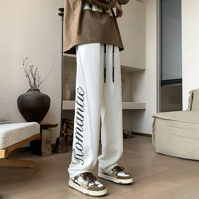 

Vibe Streetwear Sweatpants Men Loose Fashion Letter Printed Wide Leg Pants Elastic Waist Male Trousers Oversized Ribbon 5xl