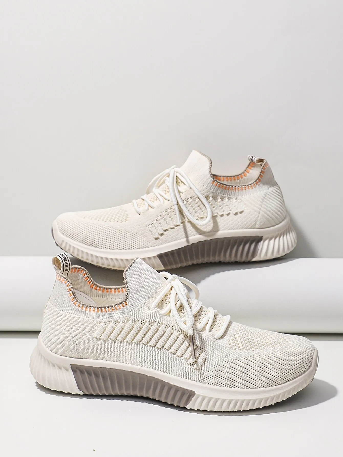 white colour running shoes