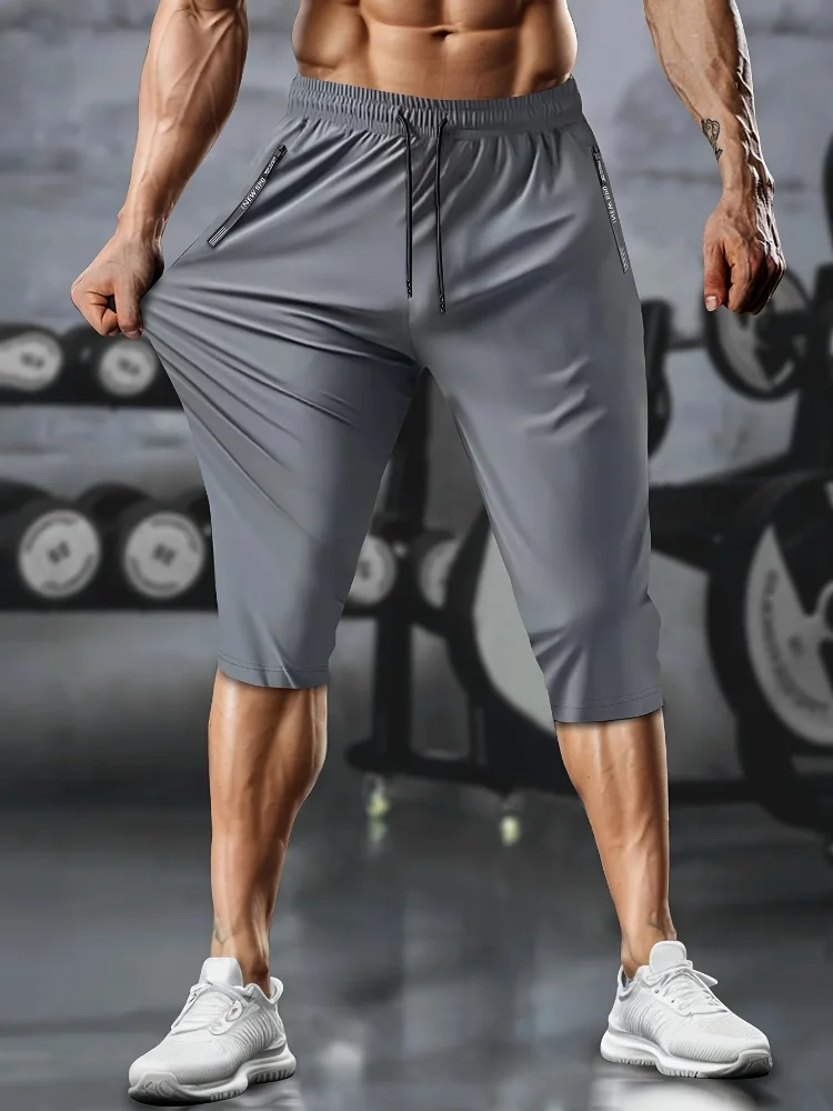 1 Stück leichte, sportliche, verkürzte Herrenhose mit Kordelzug, Reißverschlusstaschen und reflektierenden Streifen – atmungsaktives, schnell trocknendes Material – Detail 11