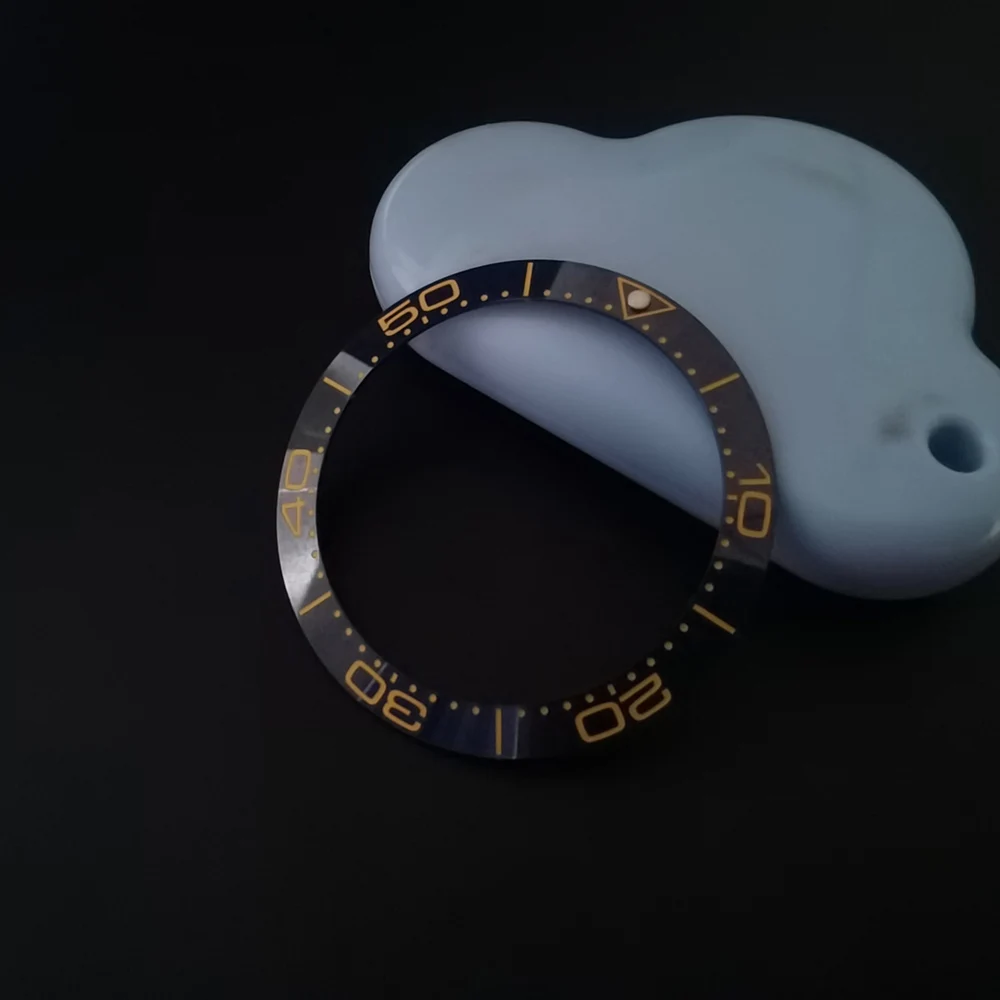 Sleek Black Blue Ceramic Bezel Insert with Green Luminous Accents