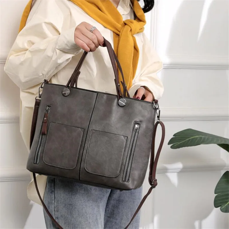Retro leather handbag with two zipper pockets, versatile tote and crossbody style, classic women’s work and business bag. gray