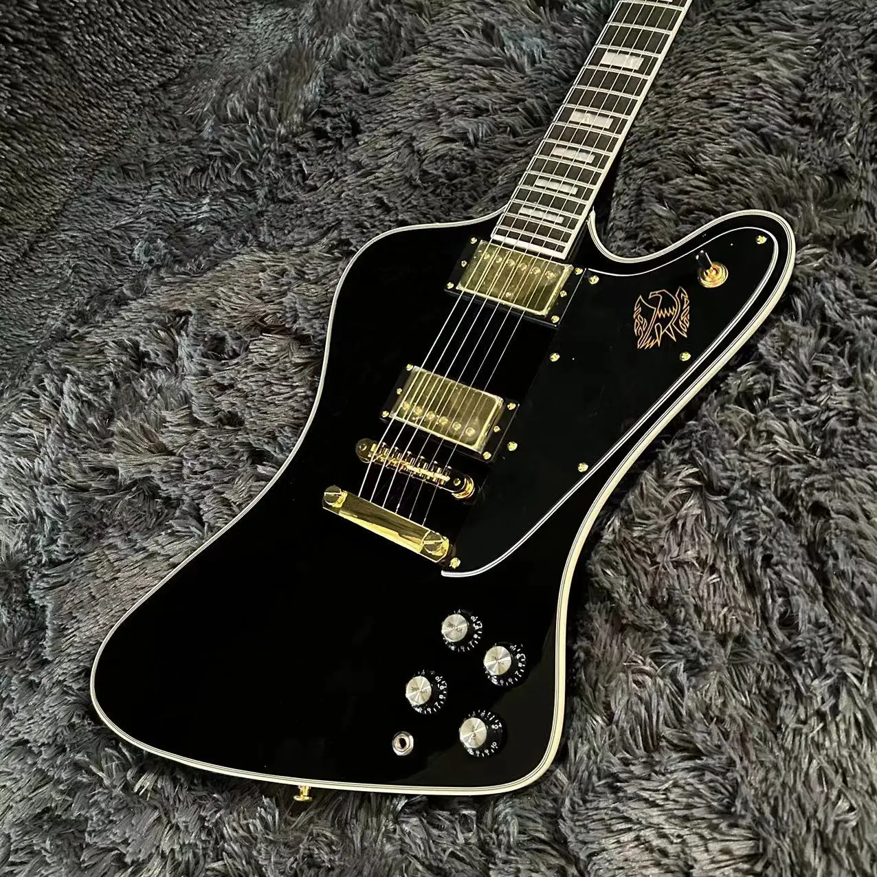 

Firebird Electric Guitar, Black Color, Mahogany Body, Rosewood Fingerboard, Golden Hardware, Tune-O-Matic Bridge, Free Shipping