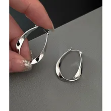  ANENJERY Silver Color Geometric Twisted Hoop Earrings for Women Niche Design Party Jewelry Gifts Pulseras Mujer 