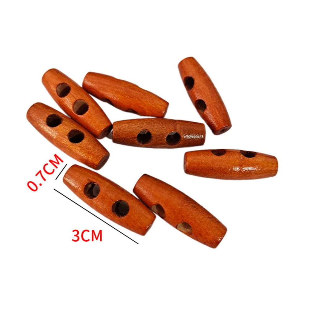 Nasture oval din lemn de măslină, accesoriu vestimentar cu nasture din lemn_voghion.com