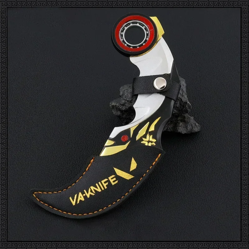 thumbnail image 1 of Cuchillo con garra Valorant Karambit Champion 2021 de 17 cm, modelo de arma, versión ponderada, espada giratoria de metal, juego periférico, regalo para niño, 1 of 5