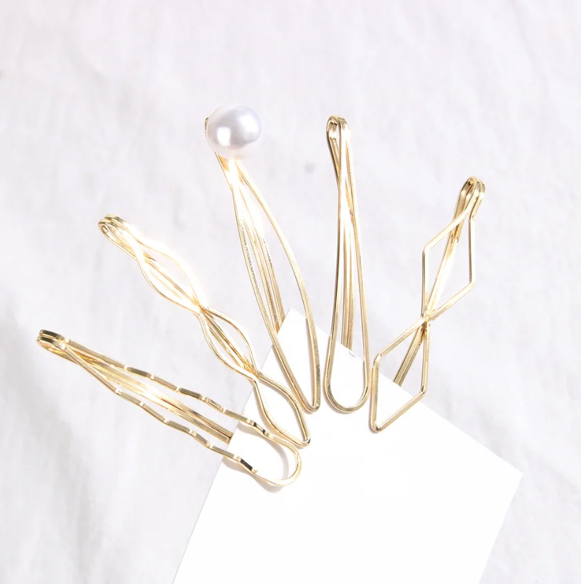 Conjunto de pregadeiras de cabelo douradas presilhas onduladas_voghion.com