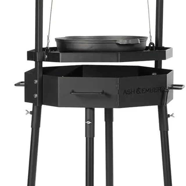 Argentine-Inspired Santa Maria Fire Grill by Titan Great Outdoors, featuring Adjustable Grate, Cast Iron Skillet, and Flywheel C 1