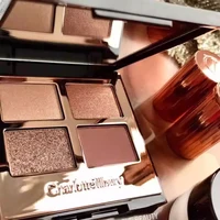 Ensemble de maquillage Charlotte Tilbury CT, hydratant pour les lèvres au collagène Water Light, poudre pressée pour un fini impeccable, fard à paupières quatre couleurs 5