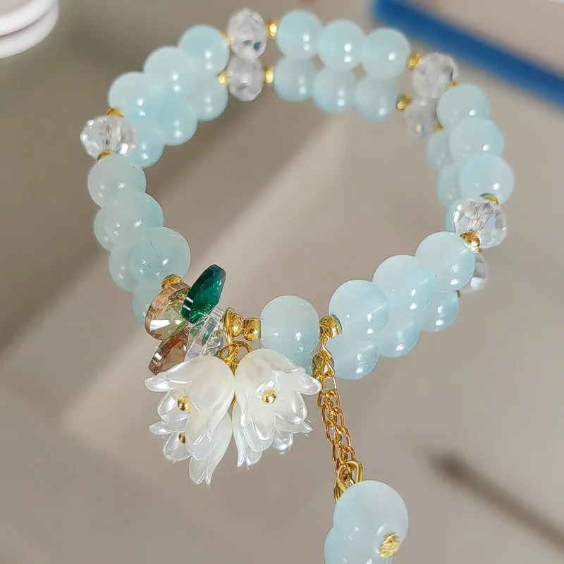 Interrupteur bracelet en perles de cristal vertes pour femme, breloque fleur de la vallée de ChimLily, élastique réglable, bijoux de mariage et d'anniversaire