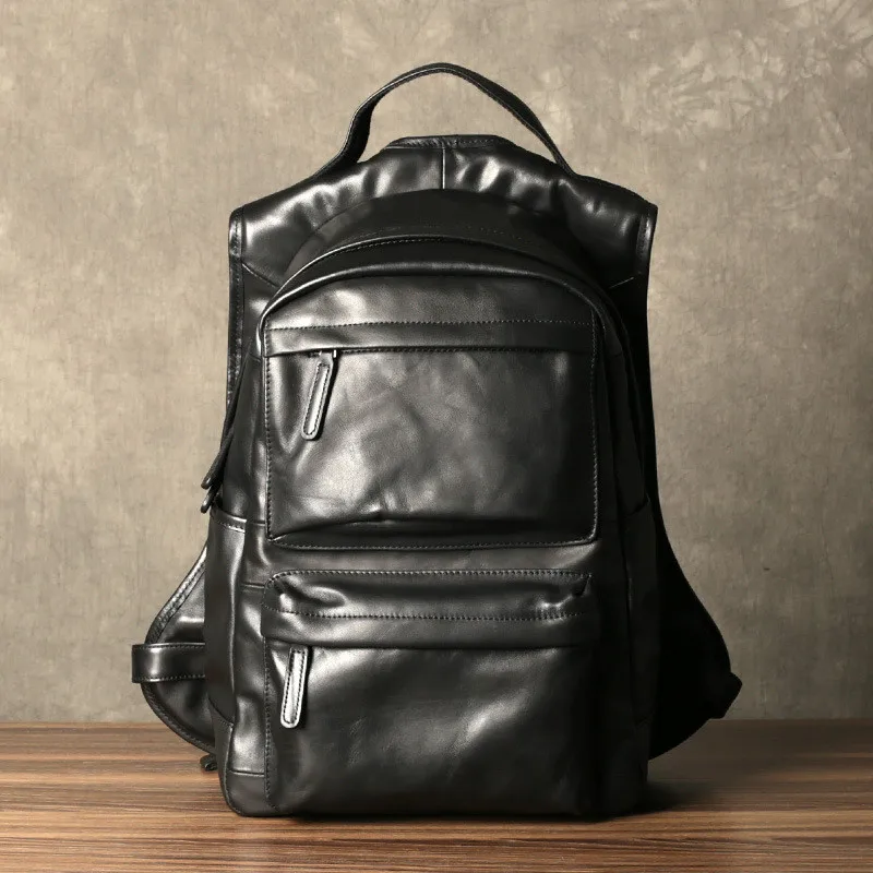 

Simple casual designer natural real leather men's black backpack for outdoor travel large capacity soft cowhite bag for students