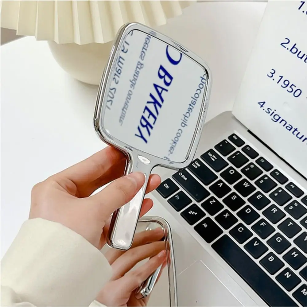 Portable High Definition Handheld Mirror Liquid Shape Silver Makeup Mirror Square Ins Vanity Mirror Household