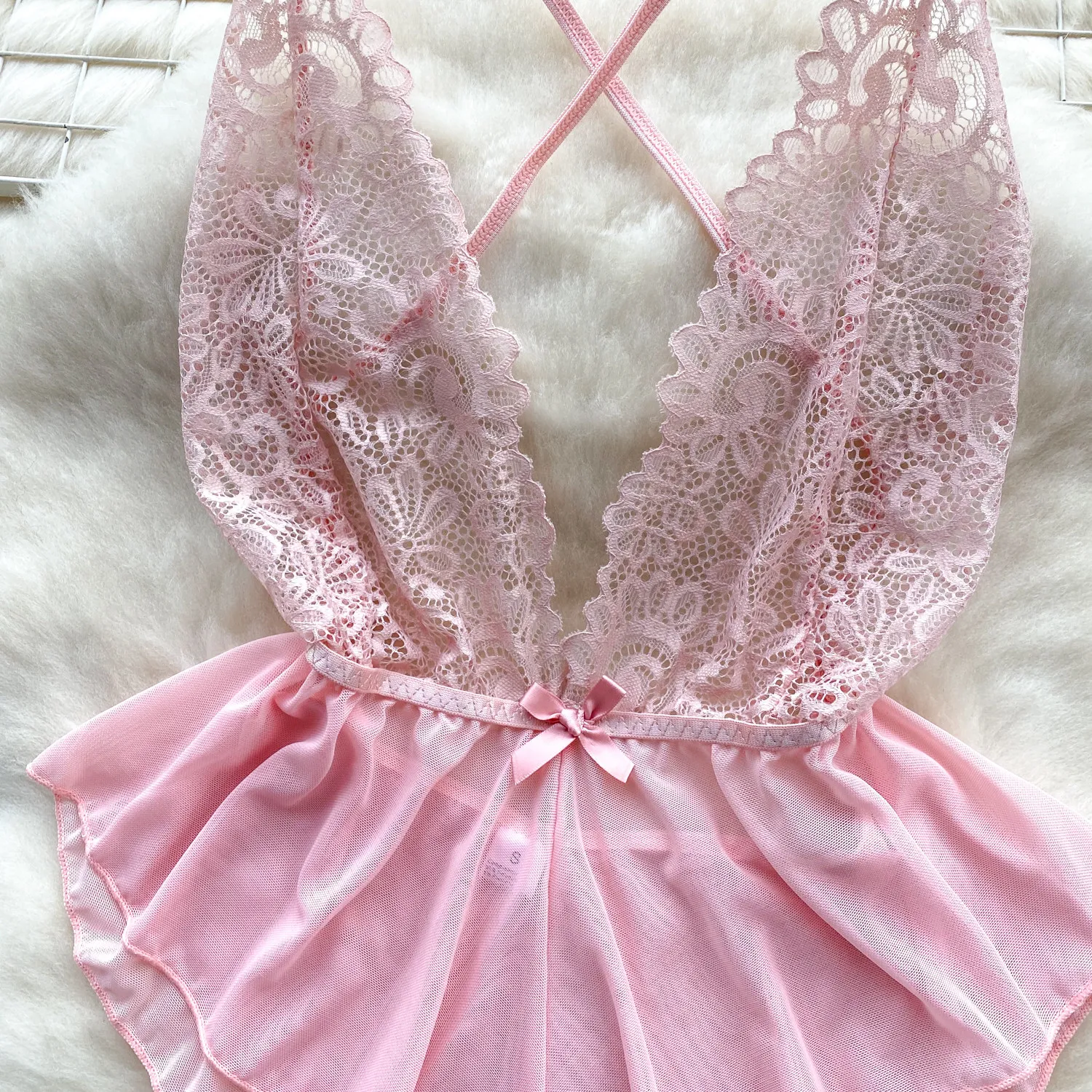 feminine one-piece bodysuit with soft gathered waist