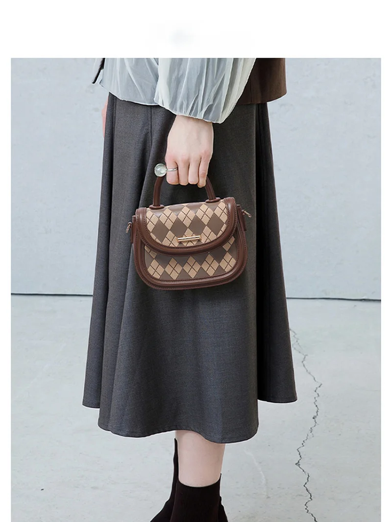 2024-spring-summer-new-lingge-bag-unique-and-high-end-saddle-bag-handheld-small-bag-one-shoulder-crossbody-bag