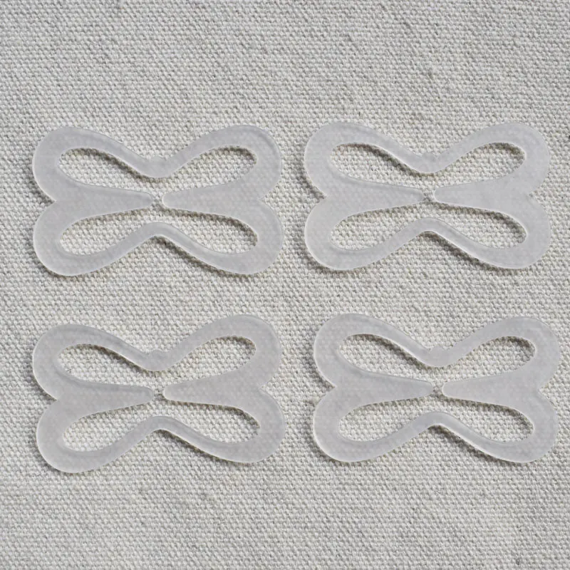 4 pieces Racer back clips, bra strap clips for the back, cross back convertors, conceal straps and cleavage control bra clips