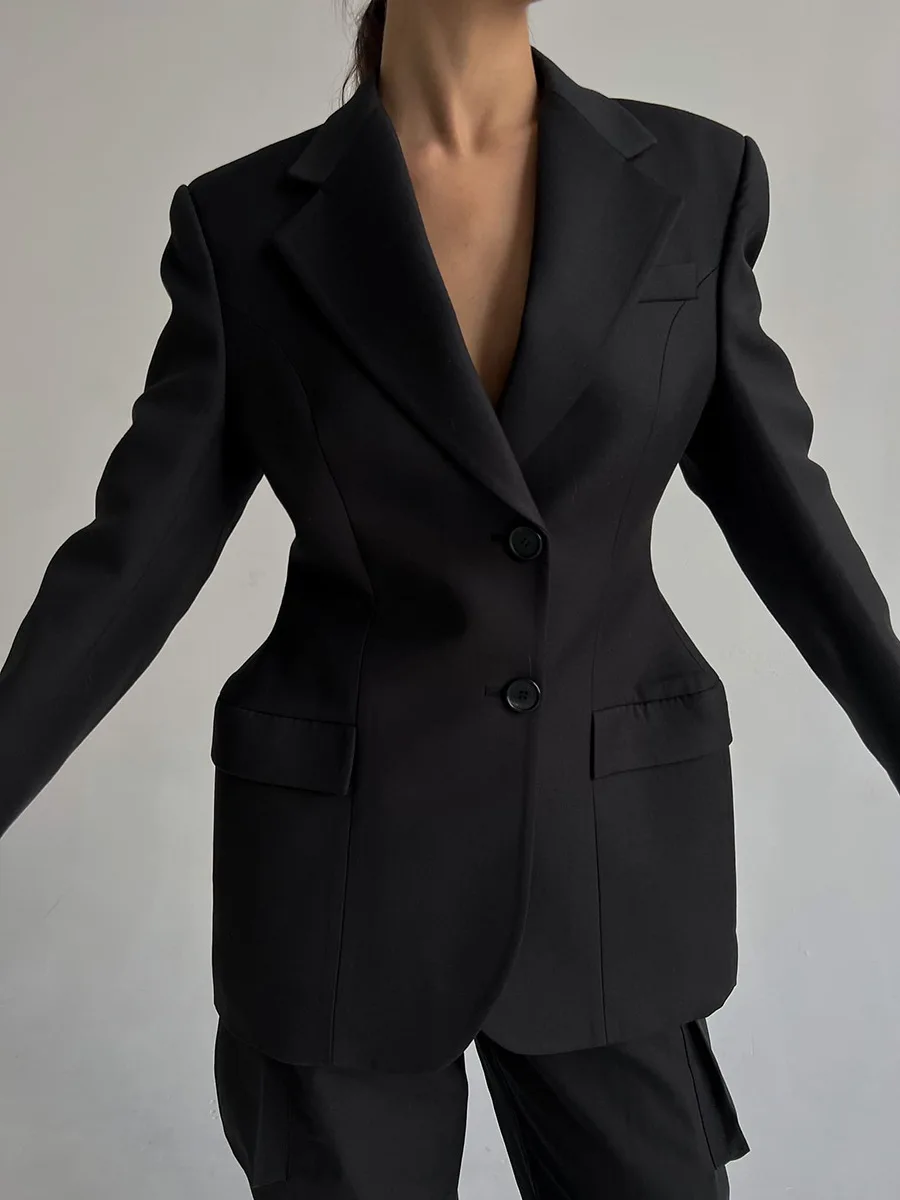 Traje de solapa negra para mujer, abrigo elegante de manga larga con bolsillos y retazos, blazer de cintura alta para otoño 2025
